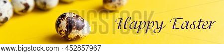 Minimal Easter Concept. Qual Spotted Easter Eggs Row On Yellow Background. Easter Card With Copy Spa