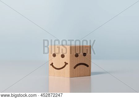 Service Rating, Ranking, Customer Review, Satisfaction And Emotion Concept. Wooden Block With Happy 