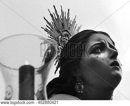Elche, Spain- April 13, 2022: Virgin Mary On Easter Parade With Bearers And Penitents Through The St