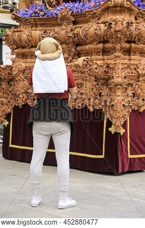 Elche, Spain- April 13, 2022: Bearers Of Easter Parade Through The Streets Of Elche City In The Holy