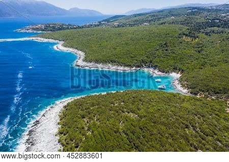 Aerial Top Down View Of Dafnoudi Beach In Kefalonia, Greece. Remote Bay With Pure Crystal Clean Turq