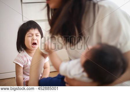 Image Of A Girl Crying At Home