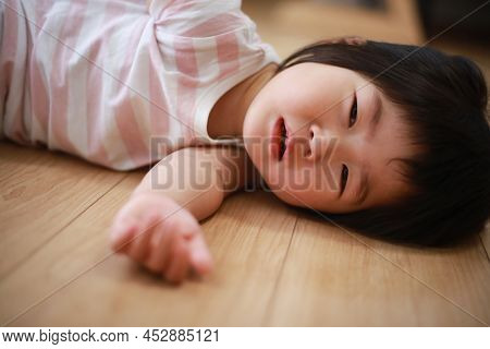 Image Of A Girl Crying At Home
