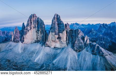 Aerial View Of Tre Cime Di Lavaredo At Dusk Light. Sesto Dolomites, Italy