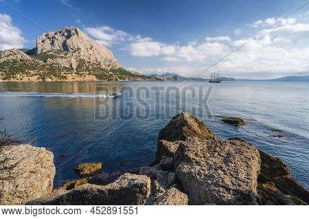 View Of The Sea Bay In The Village Novyi Svit On The Background Of Mount Falcon In The Crimea In The