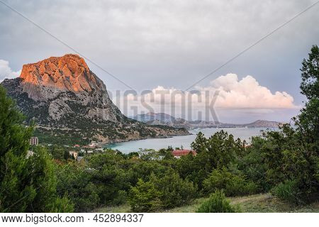 Aerial Panoramic View Of Mount Falcon Lit By Pink Sunset In Novyi Svit During Autumn Season. Sudak, 