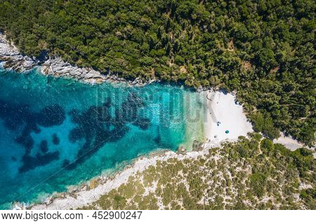 Aerial Top Down View Of Dafnoudi Beach In Kefalonia, Greece. Remote Bay With Pure Crystal Clean Turq