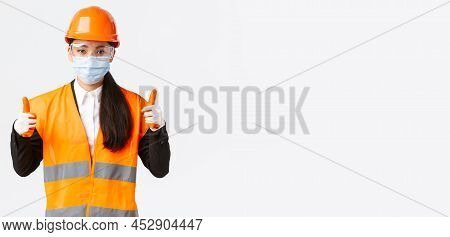 Covid-19 Safety Protocol At Enterpise, Construction And Preventing Virus Concept. Confident Female A