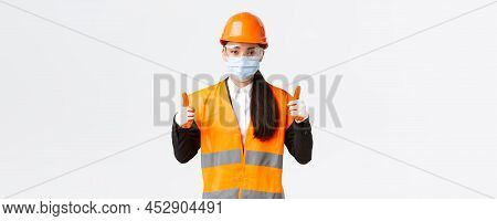 Covid-19 Safety Protocol At Enterpise, Construction And Preventing Virus Concept. Confident Female A