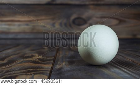Araucana Egg On Wooden Background. Light Blue Egg From Araucana Chicken. Easter Festival Concepts. E