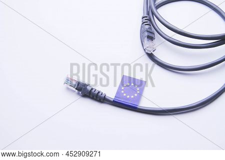 Internet In The European Union. Internet Cable With European Union Flag. Connecting A Pc To The Inte