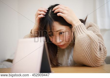 Image Of A Woman Who Cares About Her Hair