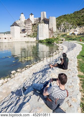 Golubac, Serbia - September 16, 2017: Selective Blur On A Couple Of Lovers Taking Pictures In Front 