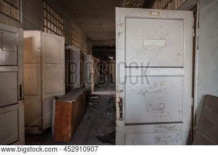 Selective Blur On A Lobby Interior Of An Abandoned Office Building, In A Dirty And Damaged Corridor 