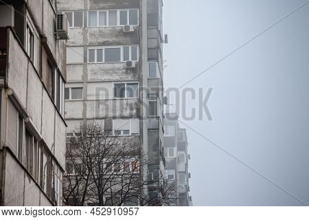 Selective Blur On Communist Housing Buildings, Decay, Diplapidated, In Belgrade, Serbia, During A Fo