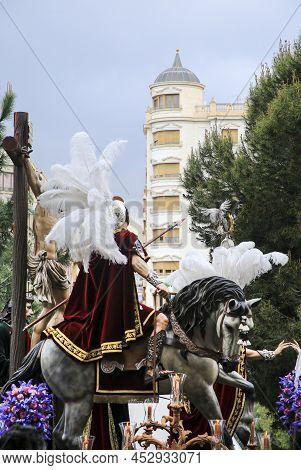 Elche, Spain- April 13, 2022: Easter Parade With Bearers And Penitents Through The Streets Of Elche 