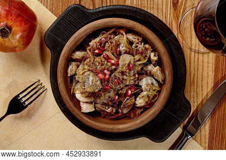Traditional Georgian Kuchmachi Of Chicken Livers, Hearts And Gizzards With Onion And Pomegranate See