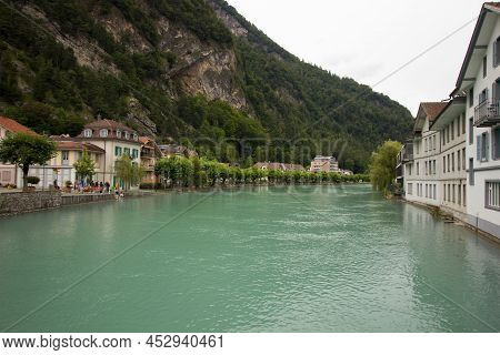 Green Aare River In Unterseen Near Interlaken