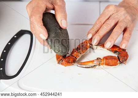 Close Up Of  The Process Of Breaking Down A Fresh Crab To Take Out The Flesh