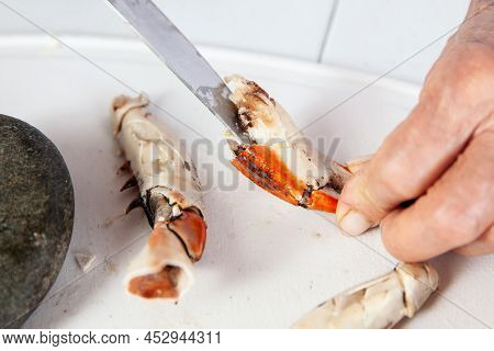 Close Up Of  The Process Of Breaking Down A Fresh Crab To Take Out The Flesh