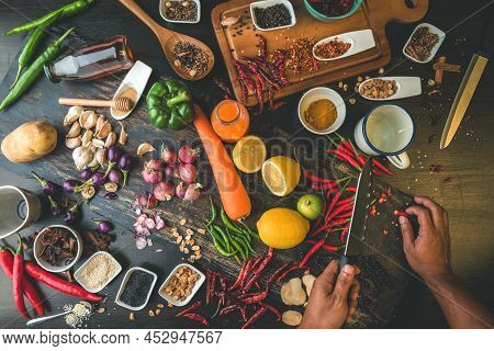 Healthy Food Herbs Spices For Use As Cooking Ingredients On A Wooden Background With Fresh Organic V