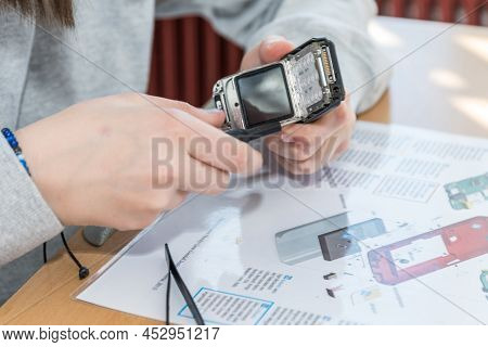 Old Mobile Phone Recycling By Technician - Disassemble Mobile Phone Into Individual Parts