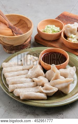 Pempek Served On Grey Unfinished Cement Table. Pempek Is Traditional Food From Indonesia. Made Of Fi