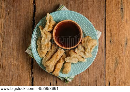 Pempek Served On Rustic Wooden Table. Pempek Is Traditional Food From Indonesia. Made Of Fish And Ta