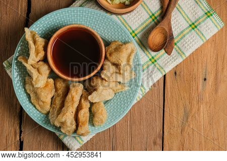 Pempek Served On Rustic Wooden Table. Pempek Is Traditional Food From Indonesia. Made Of Fish And Ta