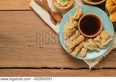 Pempek Served On Rustic Wooden Table. Pempek Is Traditional Food From Indonesia. Made Of Fish And Ta