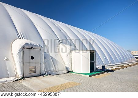 Grodno - April 2022: Inflatable Air Dome Stadium. Inflated Tennis Air Dome Arena Entrance Door Into 