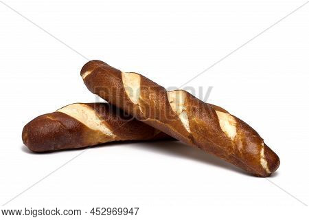 Close Up Of Two Freshly Baked Traditional Tyrolean Bread Sticks Called Laugenstangerl Stacked On Top