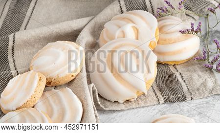 Portuguese Sweets Cavacas On Napkin In A Table. Typical Cookies With Sugar