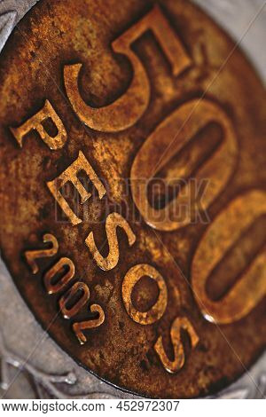 Translation: 500 Pesos. Coin Of 500 Chilean Pesos Closeup. Peso Of Chile. News About Economy Or Bank