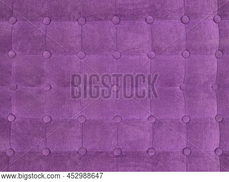 Upholstery Of Velour Buttoned Purple Violet Color Fabric, Wall Pattern. Elegant Vintage Quilted Sofa