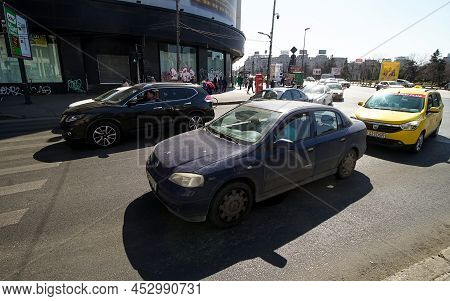 Bucharest, Romania - March 24, 2022: Cars In Traffic At Rush Hour On A Boulevard Near \