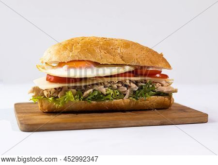 Homemade Hoagie With Meat Chicken Egg, Lettuce And Tomato. Official Sandwich Of Philadelphia. Nation