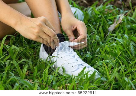 Hands Lacing With Bootlace The Sneaker Closeup