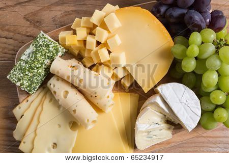 Cheese Plate Variation On A Wooden Table