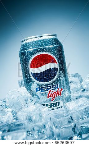 MOSCOW, RUSSIA-APRIL 4, 2014: Can of Pepsi cola Lignt on ice. Pepsi is a carbonated soft drink that is produced and manufactured by PepsiCo. Created and developed in 1893.