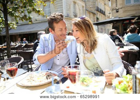 Couple eating lunch at restaurant