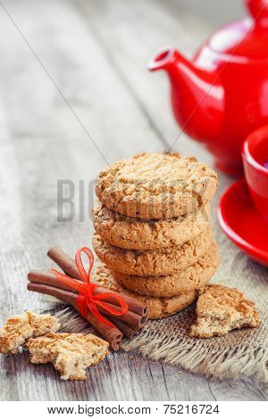 Homemade Cookies, Cinnamon Sticks, Red Teakettle And Tea Cup