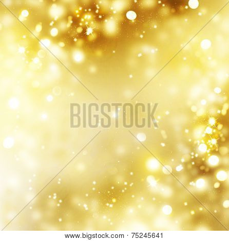 Christmas Gold Background. Golden Holiday glowing Abstract Glitter Defocused Background With Blinking Stars. Blurred Bokeh 