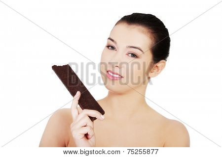 Beautiful woman holding a waffer
