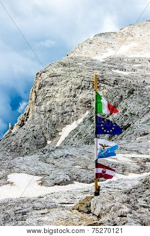 Flag On The Top Of The Mountain