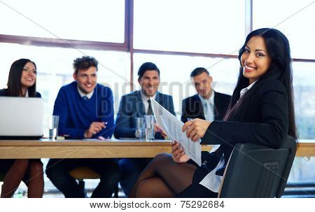 Business woman sitting at interview in office