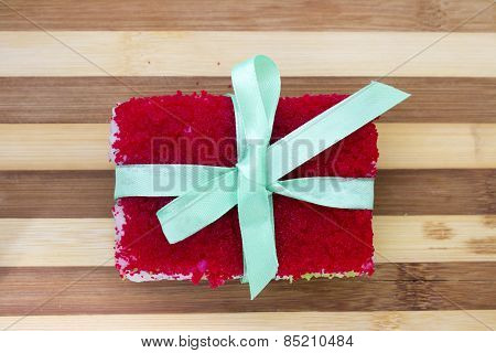 Rolls With A Ribbon On A Cutting Board Isolated Overwhite