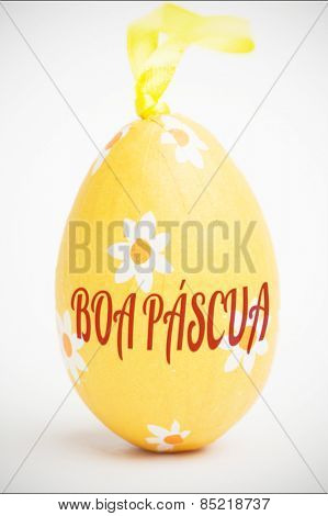 boa pascua against orange foil wrapped easter egg