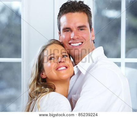 Young loving couple at new home. Relationship.