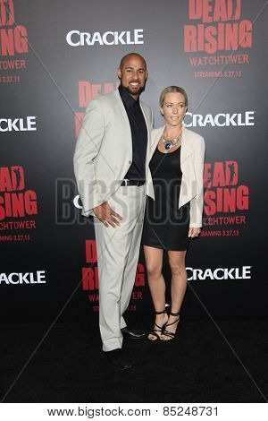 LOS ANGELES - MAR 11:  Hank Baskett, Kendra Wilkinson at the 